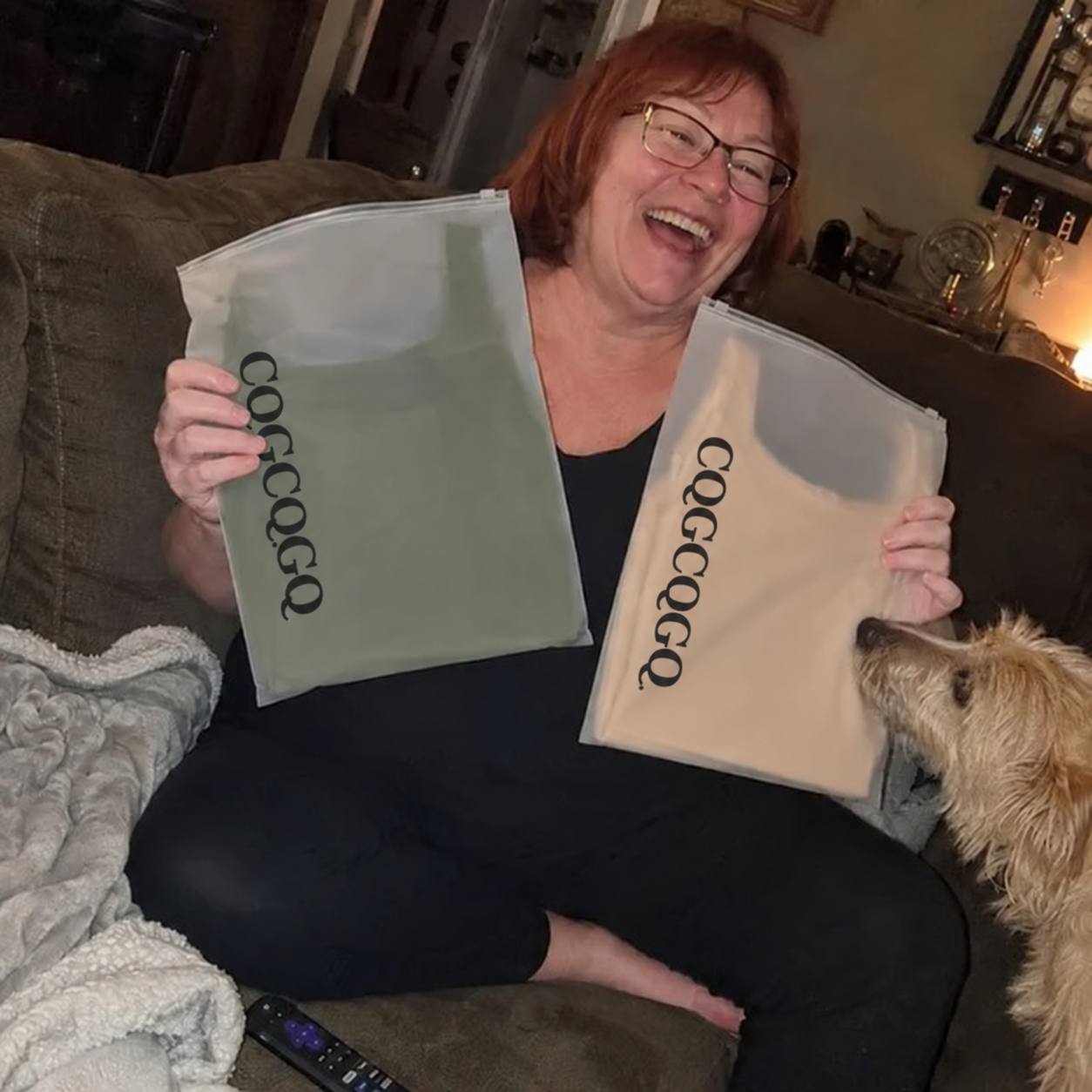 CQGCQGQ customer holding tank tops at home